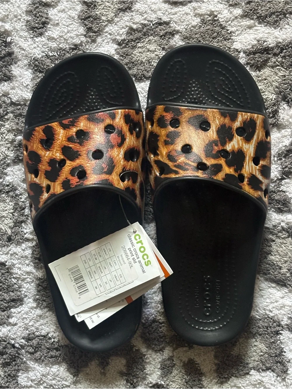 NWT CROCS Leopard Print Slide Sandals Women's 7/ Men's 5 - Picture 1 of 3